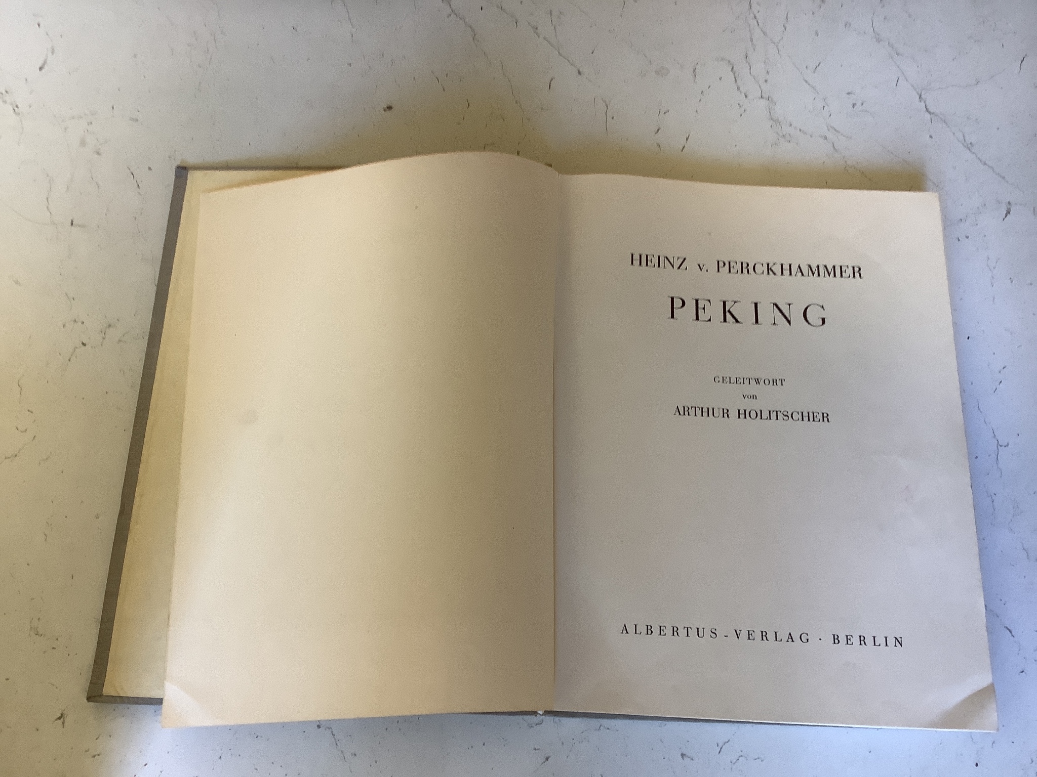 A quantity of books, to include The Bells by Edgar Allan Poe, Alice’s Adventures in Wonderland published by Thomas Nelson and Sons, Winnie-The-Pooh fifth editions and others (11)